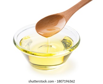 Pour The Vegetable Oil Into A Glass Bowl With A Wooden Spoon.