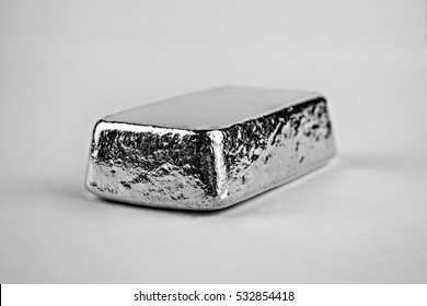 Poured Cast Solid Silver Bullion Bar, Shot In A White Studio.