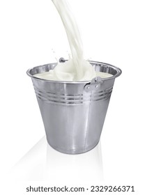 Poured milk into metal bucket with splash on white background