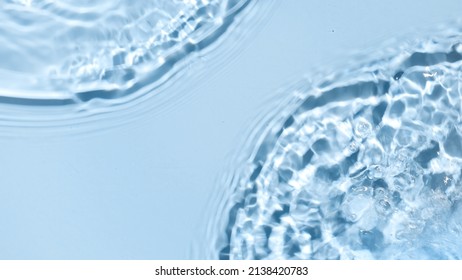 Poured Water Making Two Waves, Splashes And Ripples On Blue Background | Skincare Background, Cleansing Water Commercial