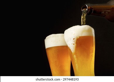 Pouring Beer Into Glass