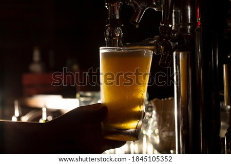 Pouring a Beer on Tap