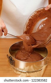 Pouring Cake Mix Into Baking Tin (springform). Making Chocolate Layer Cake. Series.