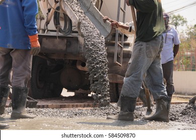 Pouring Cement During For Construction From Concrete Mixer Truck Car.selective Focus.