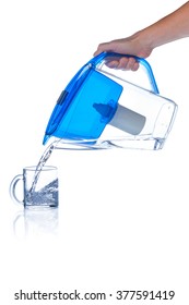 Pouring Clean Water From Water Filter Pitcher