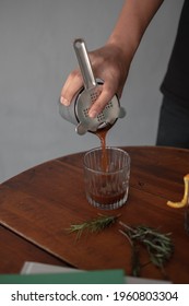 Pouring Coffee Mocktail To Glass