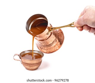 Pouring Coffee On A Cup,copper Cups , On A White Background