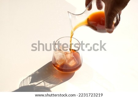 Pouring Cold Drink Sun. Cold brew Ice Summer. Summertime drink. Sunny Day Drink. Cold Tea. Iced Tea. Cold Coffee. Ice Coffee