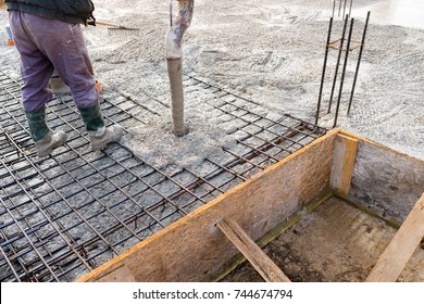 pouring concrete slab - concrete pouring during commercial concreting floors of buildings in construction