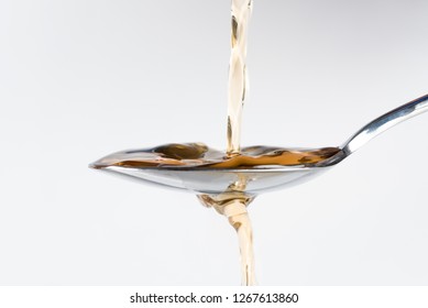 Pouring Cooking Sherry On A Spoon