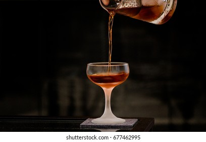 Pouring A Craft Cocktail
