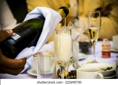 Pouring French Champagne Into A Glass