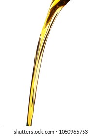 Pouring Fresh Olive Oil On White Background