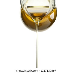 Pouring Fresh Olive Oil On White Background