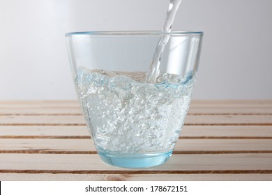 Pouring A Glass Of Carbonated Water
