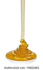 Pouring Honey Isolated On White