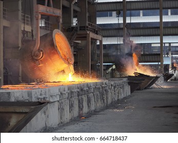 Pouring Hot Ferro-silicon for ingot shape ,then cooled and crushed into pieces of variable size 