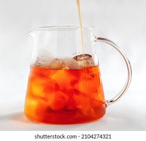 Pouring Iced Tea Into Glass Jag
