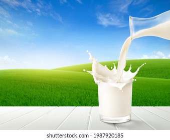 Pouring milk splash with slope green grass background. - Powered by Shutterstock