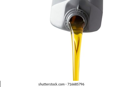 pouring motor oil from silver plastic canister isolate on white background