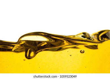 Pouring oil car motor or olive vegetable cooking and bubble isolated on white background 