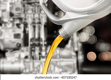 Pouring Oil Lubricant Motor Car From Bottle On Engine Background