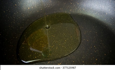 Pouring Oil On Teflon Pan.