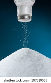 Pouring Salt From A Salt Pot