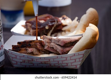 Pouring Sauce Of BBQ Beef Meal