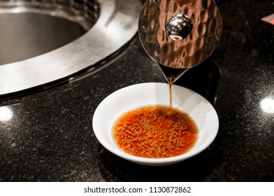 Pouring Sauce For Beef Barbecue At Japanese Food Restaurant, Sauce With Sesame For Beef Grilled, Japanese Style, Bbq, Delicious Japanese Sauce For Beef And Pork Grilled