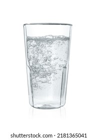 Pouring Soda Water Into Glass On White Background