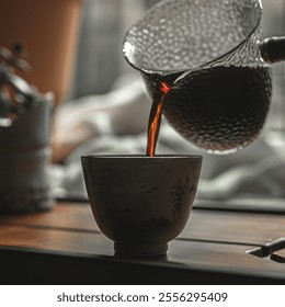 Pouring steaming coffee into a rustic ceramic cup is a delightful and comforting experience - Powered by Shutterstock