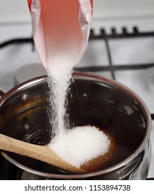 Pouring Sugar Into Treacle Syrup