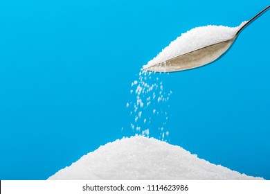 Pouring Sugar On A Pile Of Sugar