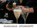 Pouring and tasting of sparkling wine champagne on winter weekend festival in December on Avenue de Champagne, Epernay, Champagne region, France