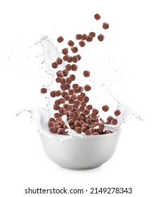 Pouring of tasty chocolate corn balls into bowl with milk splashes on white background - Shutterstock ID 2149278343