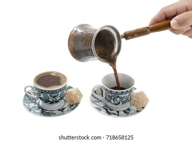  Pouring Turkish Coffee In Cup Over White Background.