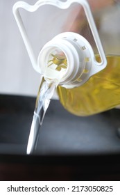 Pouring Vegetable Oil Into Frying Pan.