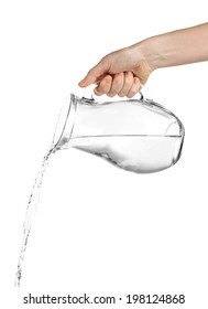Pouring Water From Glass Pitcher, Isolated On White