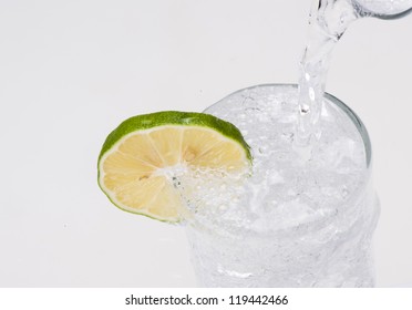 pouring water into glass - Shutterstock ID 119442466