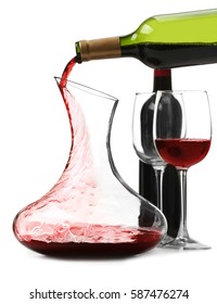 Pouring Wine In Carafe On White Background