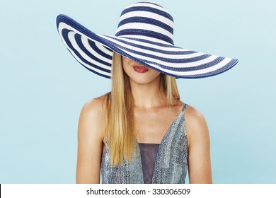 Pouting Young Lady In Summer Hat