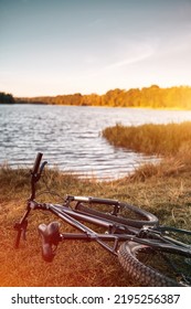 POV Bike Handlebar With A Nature Backdrop. Leisure Time In Summer Evening Concept.