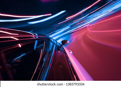 POV Of Car Driving At Night City With Motion Blur Effect. Transportation And Traffic Concept