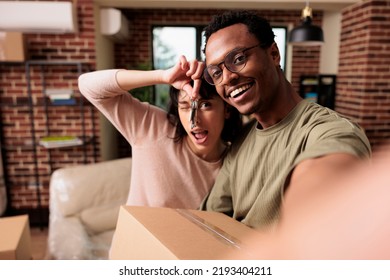 POV Of Diverse Homeowners Having House Keys Of Rented Flat, Moving In New Household Property Together To Start Family. Enjoying Relocation And Life Event For New Beginnings, Real Estate.