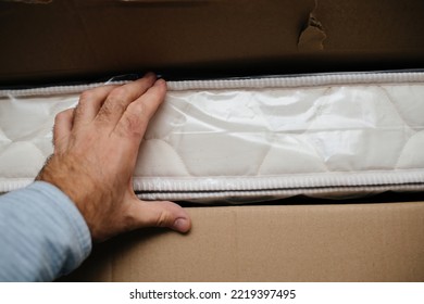 POV Male Hand Unboxing Unpacking New Mattress From Recycled Carton Cardboard Package Made From Bio Foam Organic Furniture