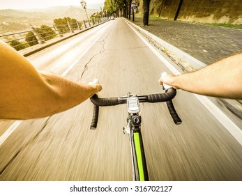 POV, Original Point Of View. Cycling On City Road In Sunset.