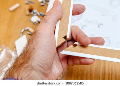 POV Personal Perspective Male Hand Holding Details Made From Pressured Wooden Board Of Modern Furniture Board