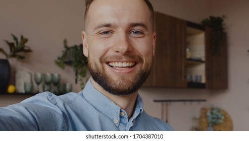 POV PHONE CAMERA VIEW Handsome Caucasian man having a video call with friends or partner. Stay home, quarantine life - Powered by Shutterstock