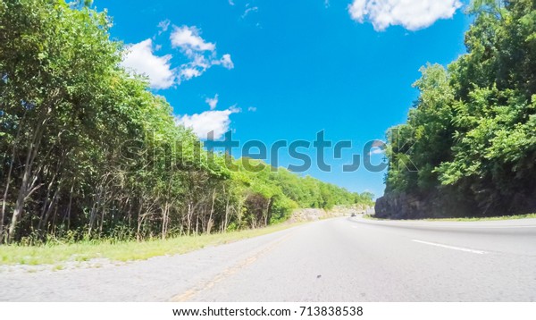 POV point of view - Driving East\
on Interstate Highway 40 through Appalachian\
Mountains.